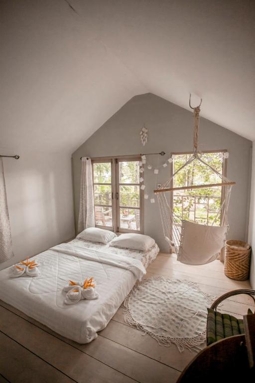 Postel nebo postele na pokoji v ubytování Cozy Huts