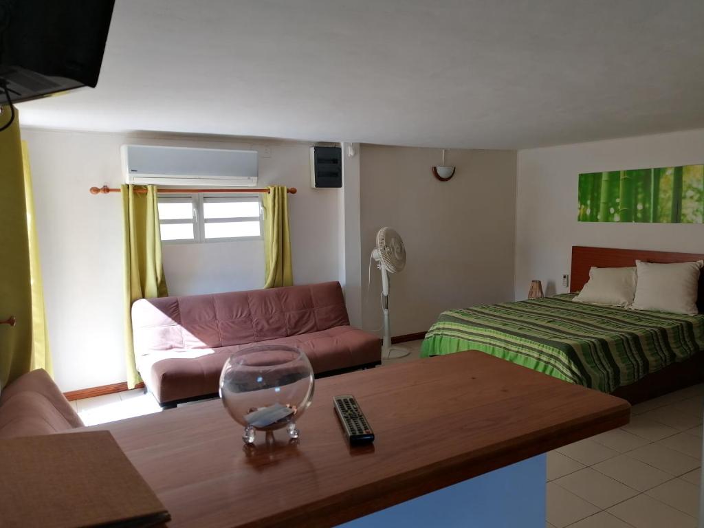 Postel nebo postele na pokoji v ubytování Terre et Mer - Studios - Ile Maurice