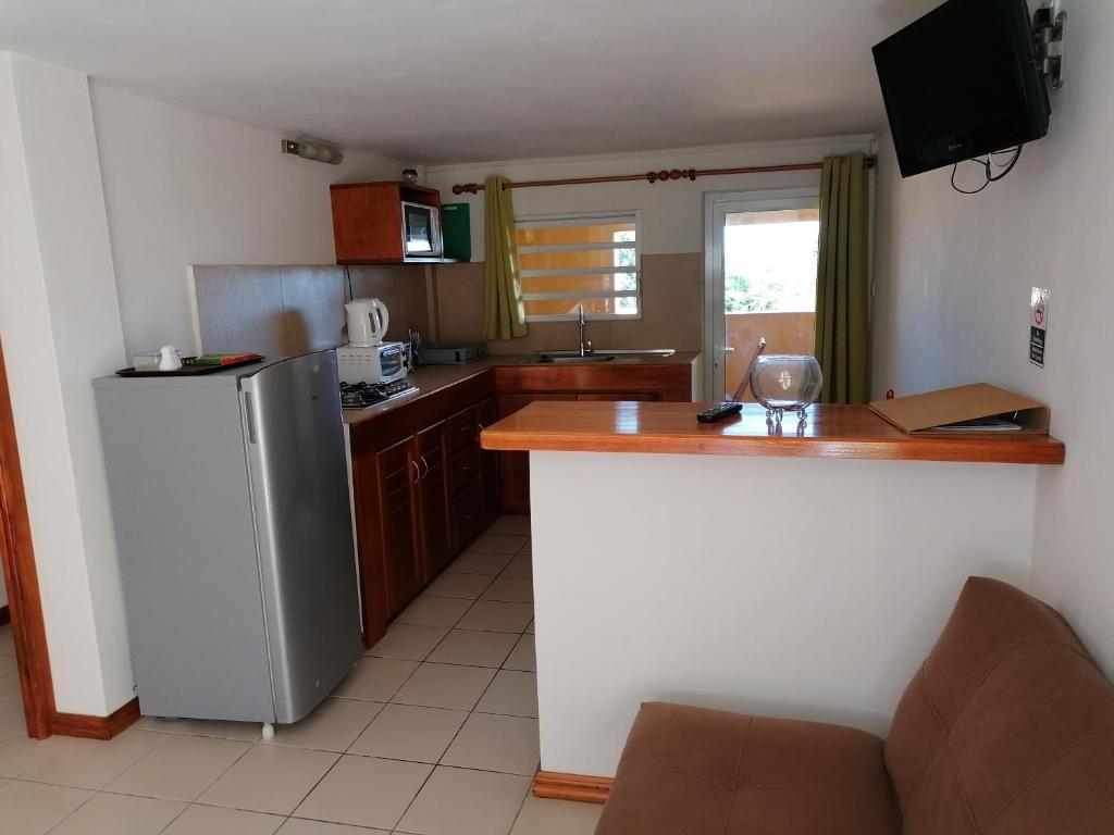 Kuchyň nebo kuchyňský kout v ubytování Terre et Mer - Studios - Ile Maurice