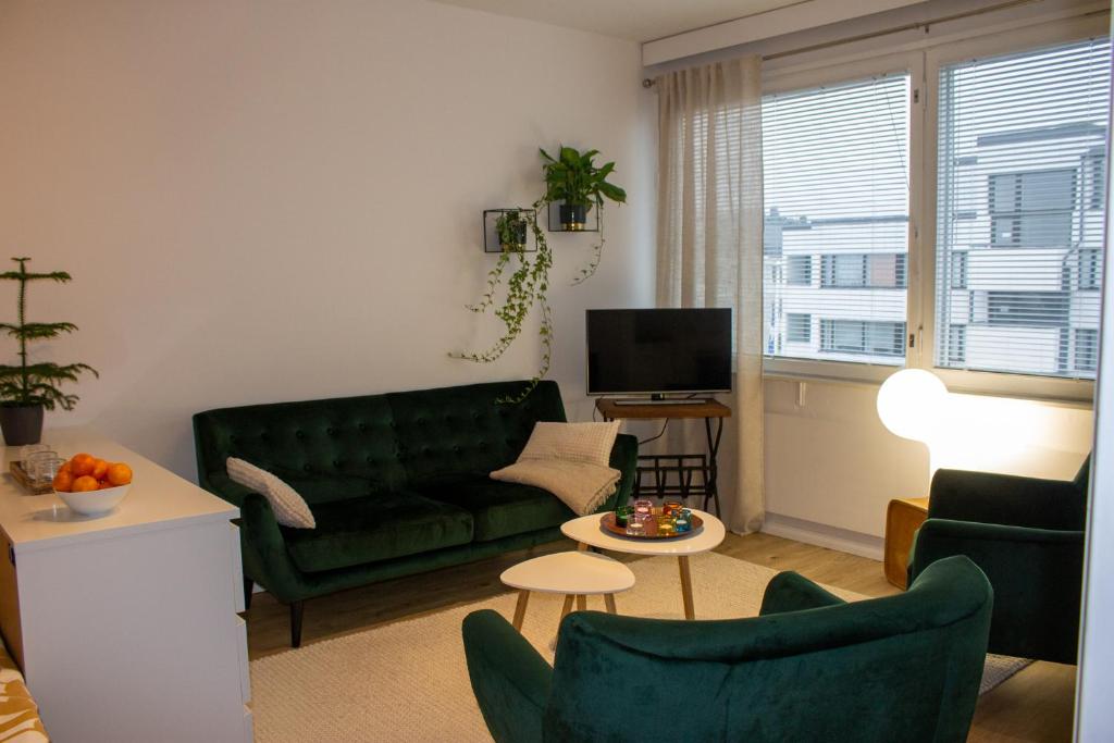 Ein Sitzbereich in der Unterkunft Lainaanranta Apartment