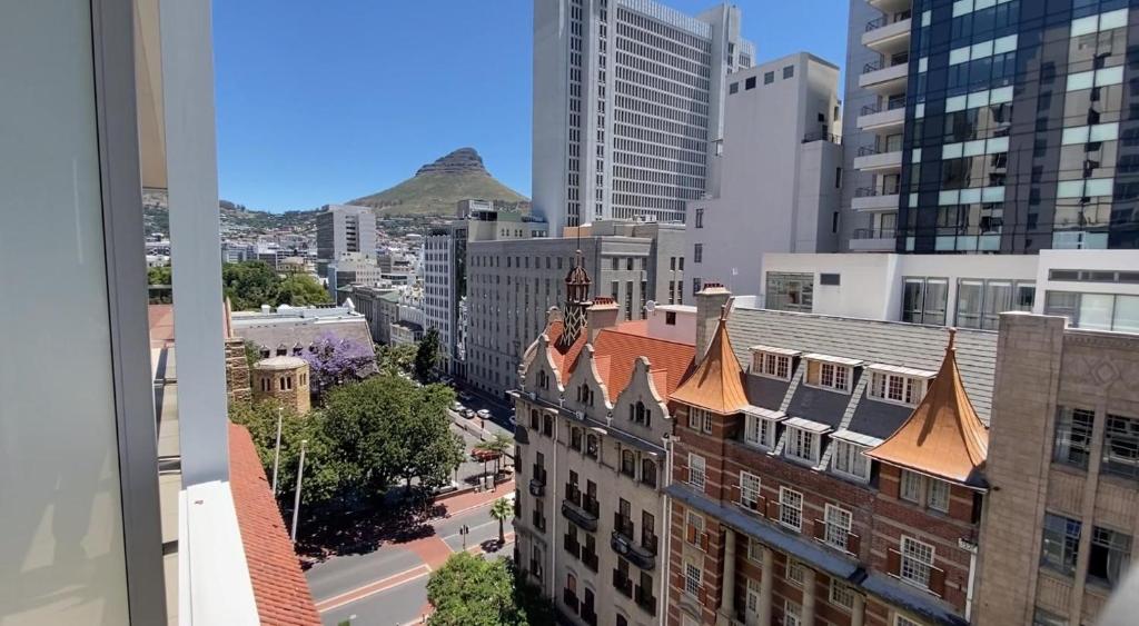 a view of a city street with buildings at Taj Cape Town - private luxury 5 star suites - very spacious with kitchenette in Cape Town