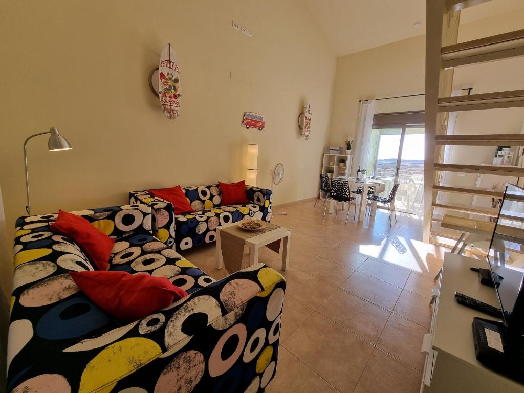 Postel nebo postele na pokoji v ubytování Villa Los Vientos only 100m to the surf beach, terrace, balcony, sea view, wifi