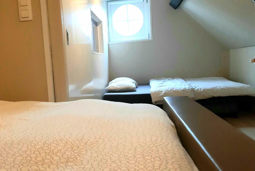 Krevet ili kreveti u jedinici u okviru objekta Cottage du Lac Studio