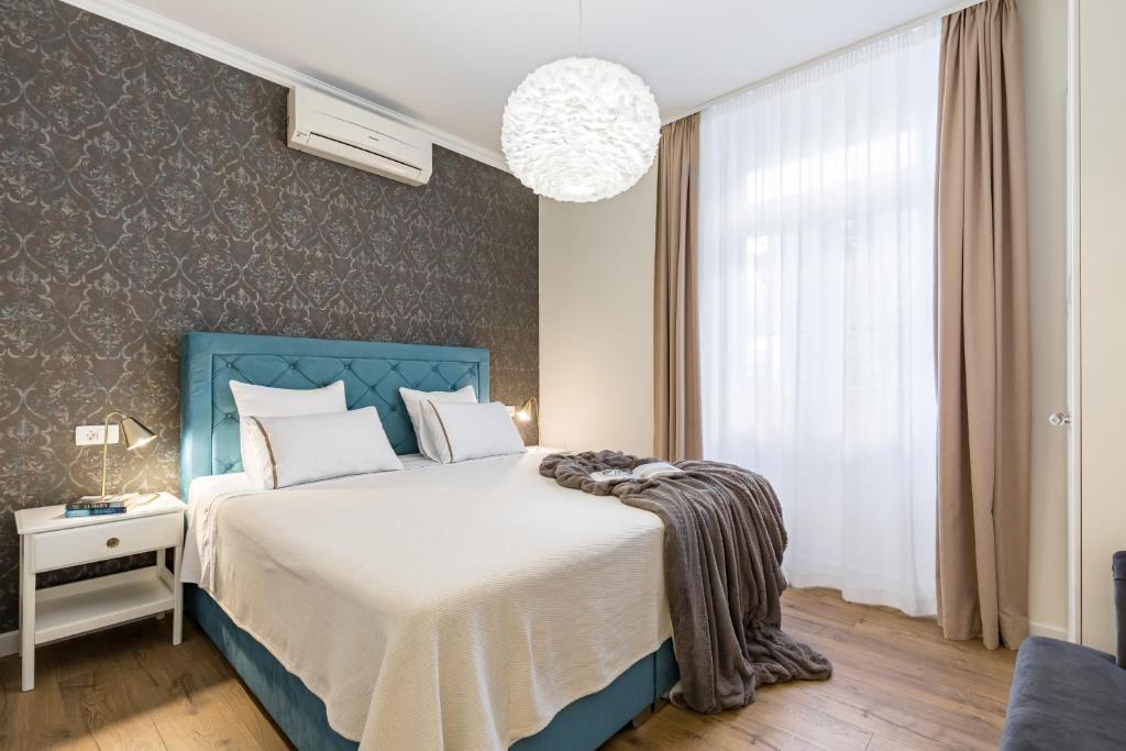 Posteľ alebo postele v izbe v ubytovaní Charming retreat in the heart of Split