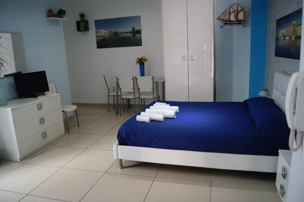 Posteľ alebo postele v izbe v ubytovaní B&B del Lungomare