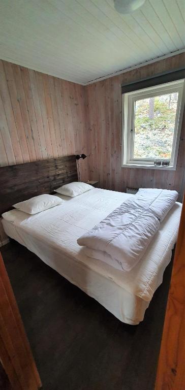 Postel nebo postele na pokoji v ubytování Fjällstuga i Foskros m bastu