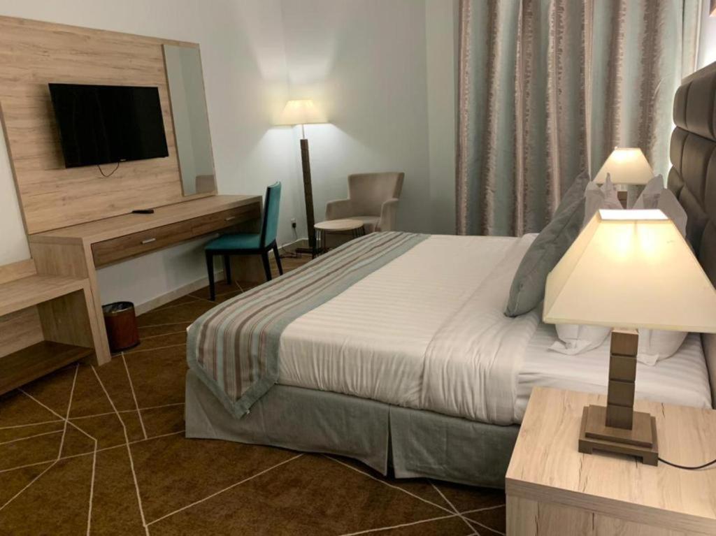 Postel nebo postele na pokoji v ubytování Fiori Hotels