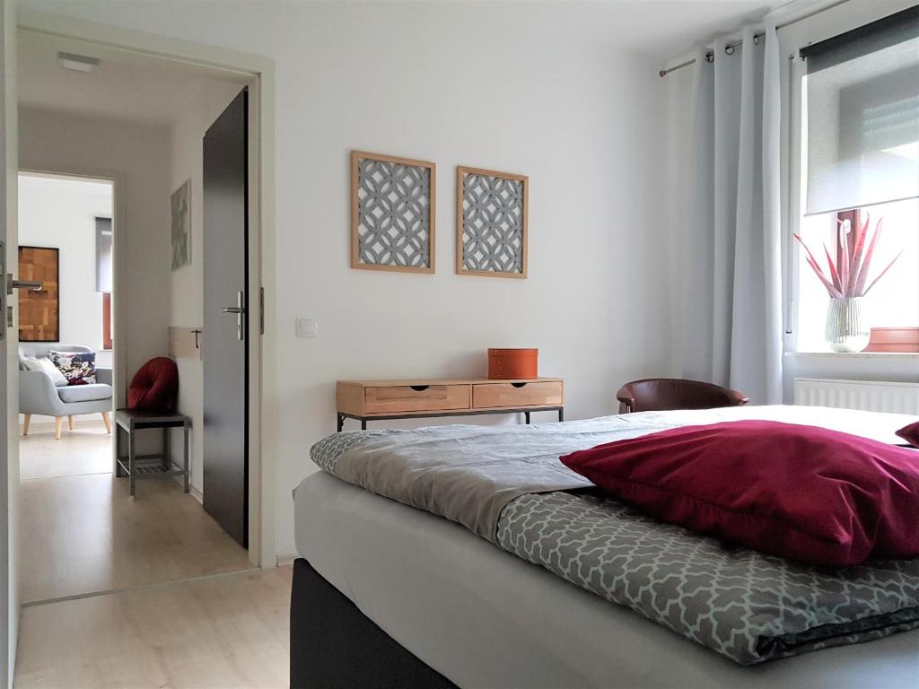 Postel nebo postele na pokoji v ubytování Ferienwohnung Königsquellenpark