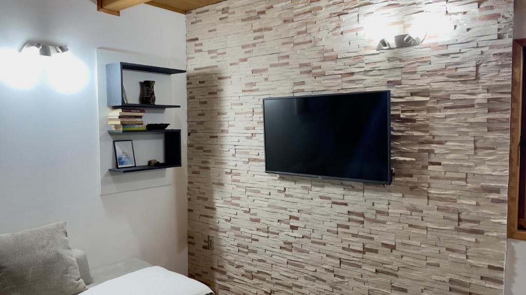 TV a/nebo společenská místnost v ubytování Apartmani d&s