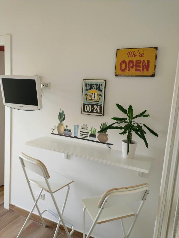 TV a/nebo společenská místnost v ubytování Mi casa tu casa