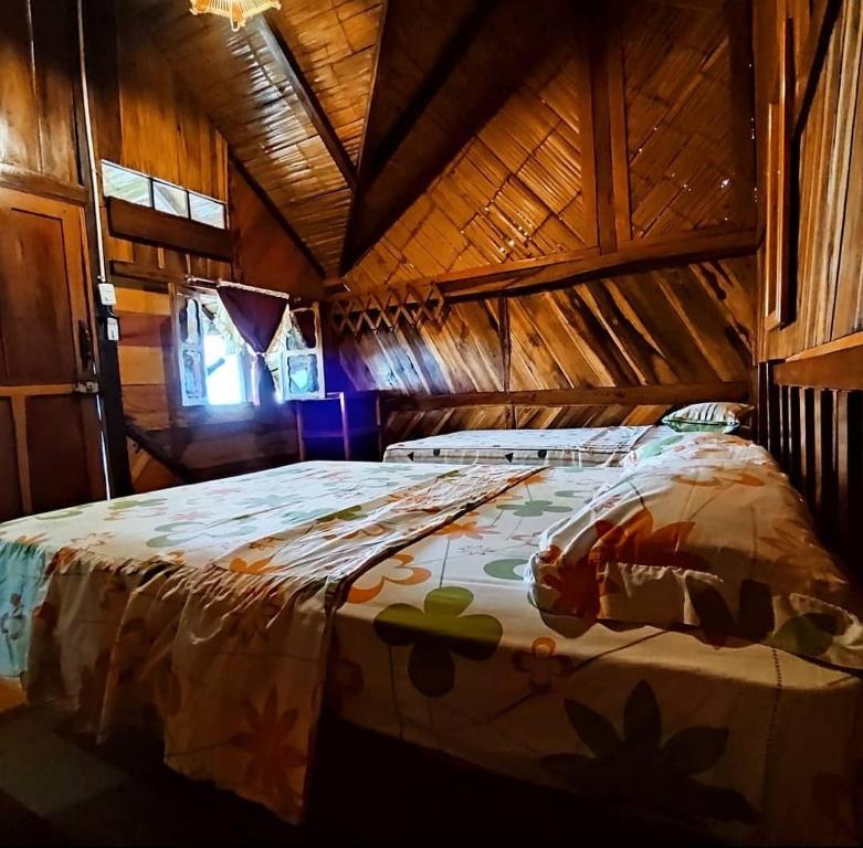 Postel nebo postele na pokoji v ubytování Hostal Mirada al Mar