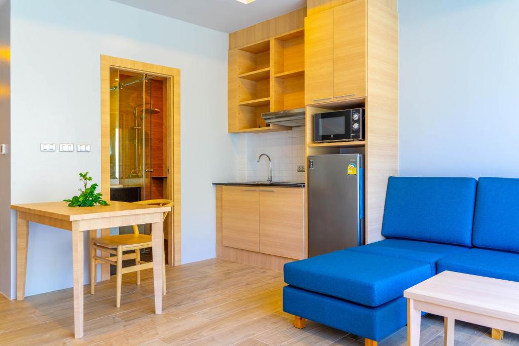 Kuchyň nebo kuchyňský kout v ubytování Golden Paradise Hotel - SHA PLUS