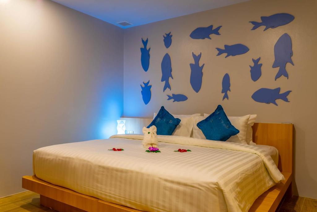 Postel nebo postele na pokoji v ubytování Golden Paradise Hotel - SHA PLUS