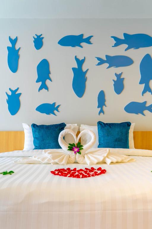 Postel nebo postele na pokoji v ubytování Golden Paradise Hotel - SHA PLUS