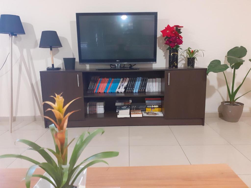 TV a/nebo společenská místnost v ubytování House escape