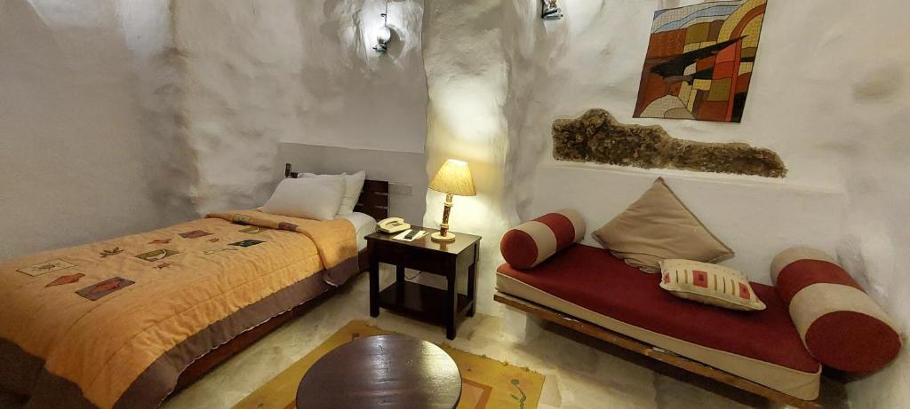 Postel nebo postele na pokoji v ubytování Hayat Zaman Hotel And Resort Petra