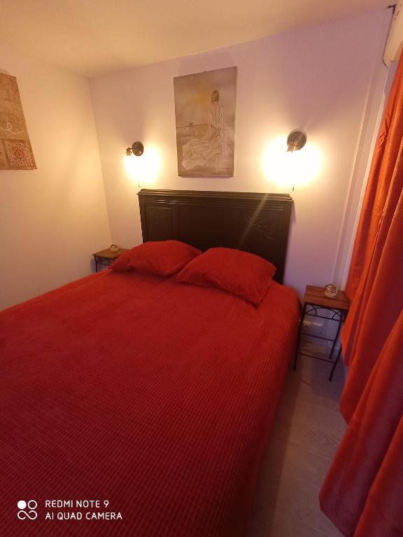 Postel nebo postele na pokoji v ubytování Chalet aux pied des vignes