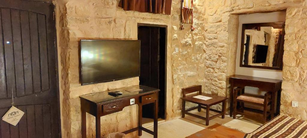 TV a/nebo společenská místnost v ubytování Hayat Zaman Hotel And Resort Petra