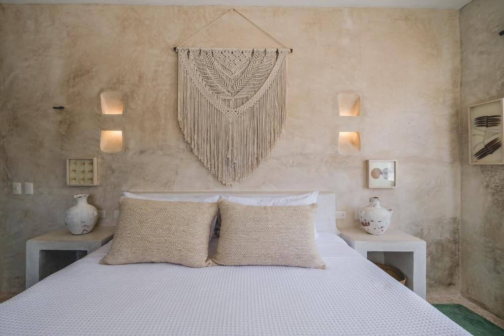 Krevet ili kreveti u jedinici u objektu Wakax Hacienda - Cenote & Boutique Hotel - Small Luxury Hotels of the World