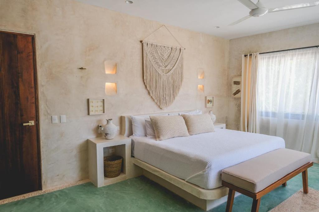 Krevet ili kreveti u jedinici u objektu Wakax Hacienda - Cenote & Boutique Hotel - Small Luxury Hotels of the World
