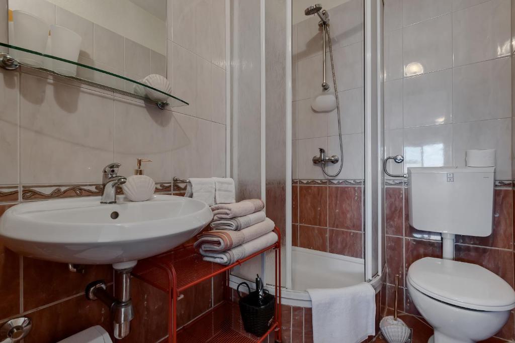 Kúpeľňa v ubytovaní Apartments Divna
