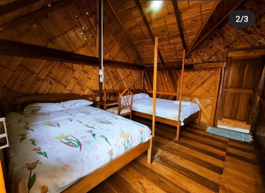 Postel nebo postele na pokoji v ubytování Hostal Mirada al Mar