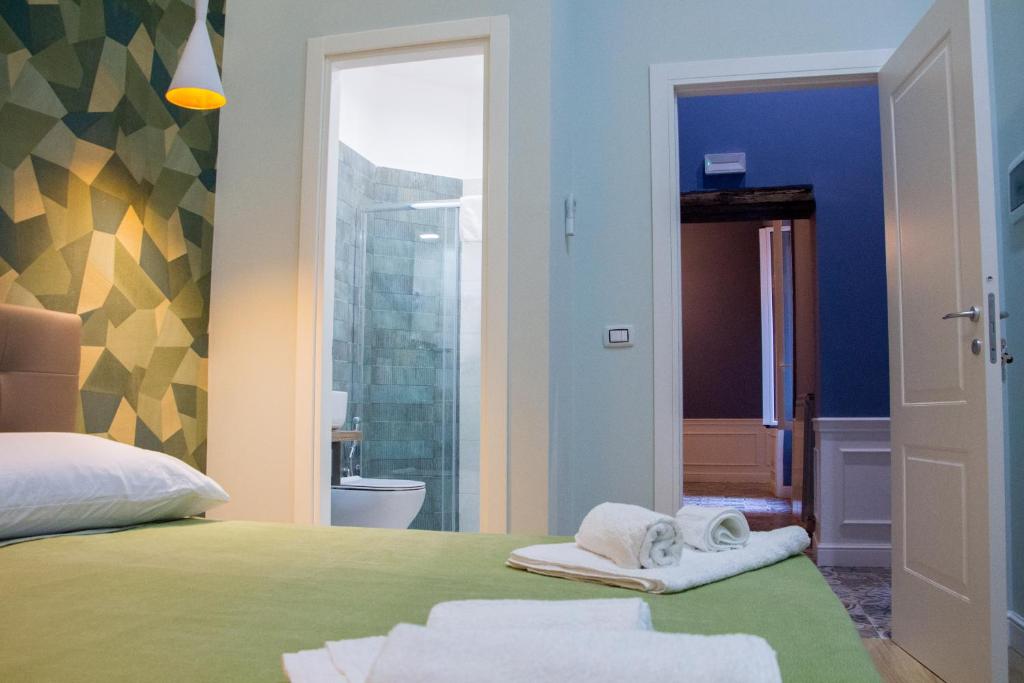 WANDERLUST NAPLES a place to stayにあるベッド