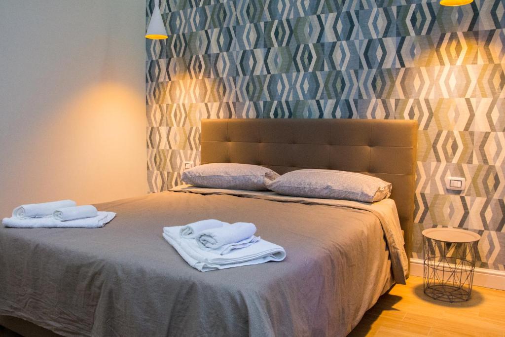 WANDERLUST NAPLES a place to stayにあるベッド