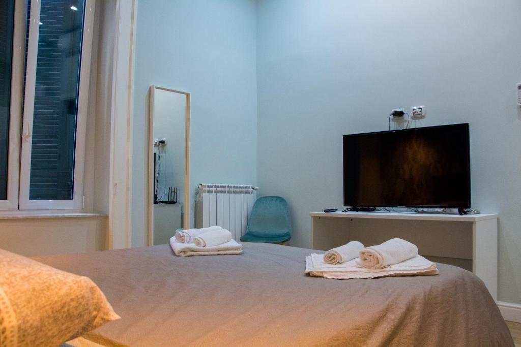 WANDERLUST NAPLES a place to stayにあるベッド