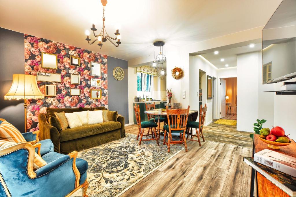 a living room with a couch and a table at Apartament Inna Bajka in Ustrzyki Dolne