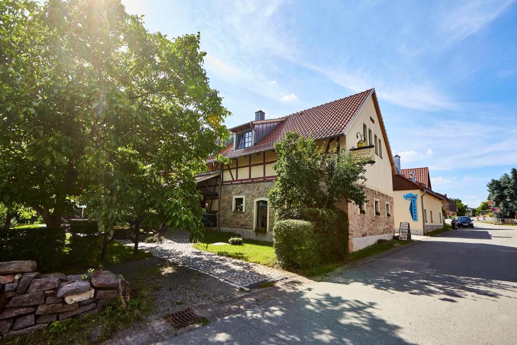 a house on the side of a street at Fischerhof in Crimmitschau