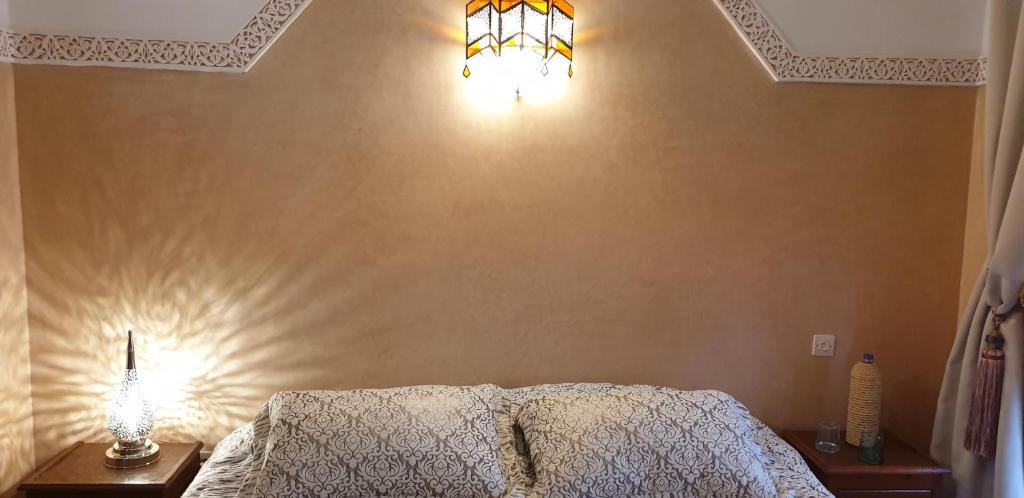Postel nebo postele na pokoji v ubytování Riad Souad Marrakech