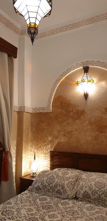 Postel nebo postele na pokoji v ubytování Riad Souad Marrakech