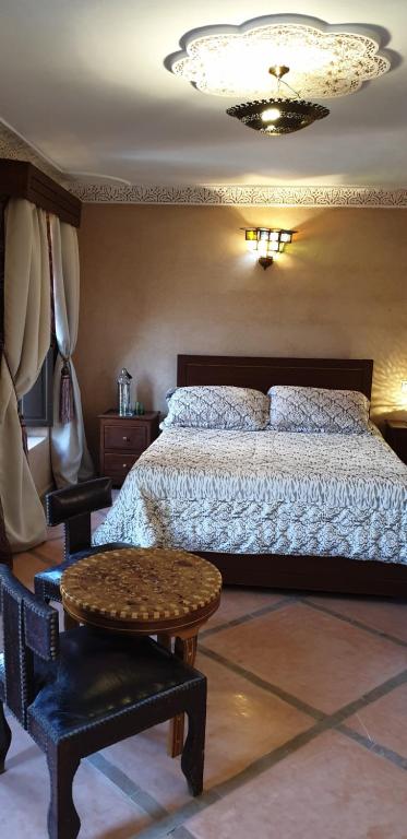 Postel nebo postele na pokoji v ubytování Riad Souad Marrakech