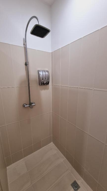 Un baño de Habitat Suites Hotel