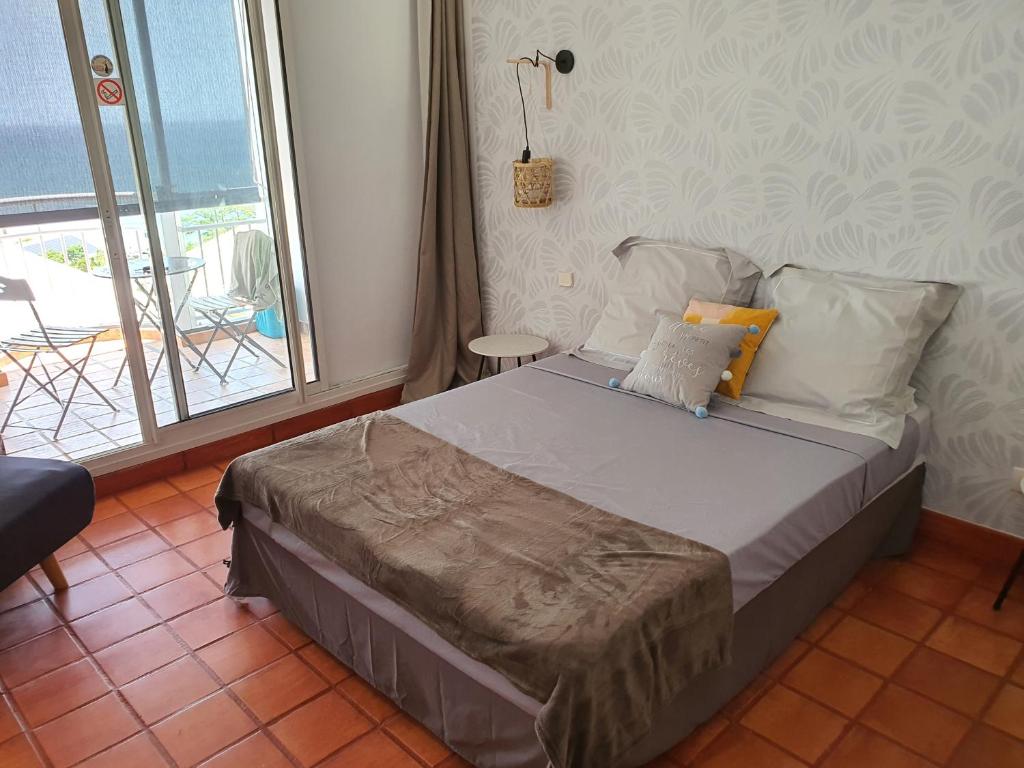 Postel nebo postele na pokoji v ubytování Vacance au soleil ! studio Abricot 310
