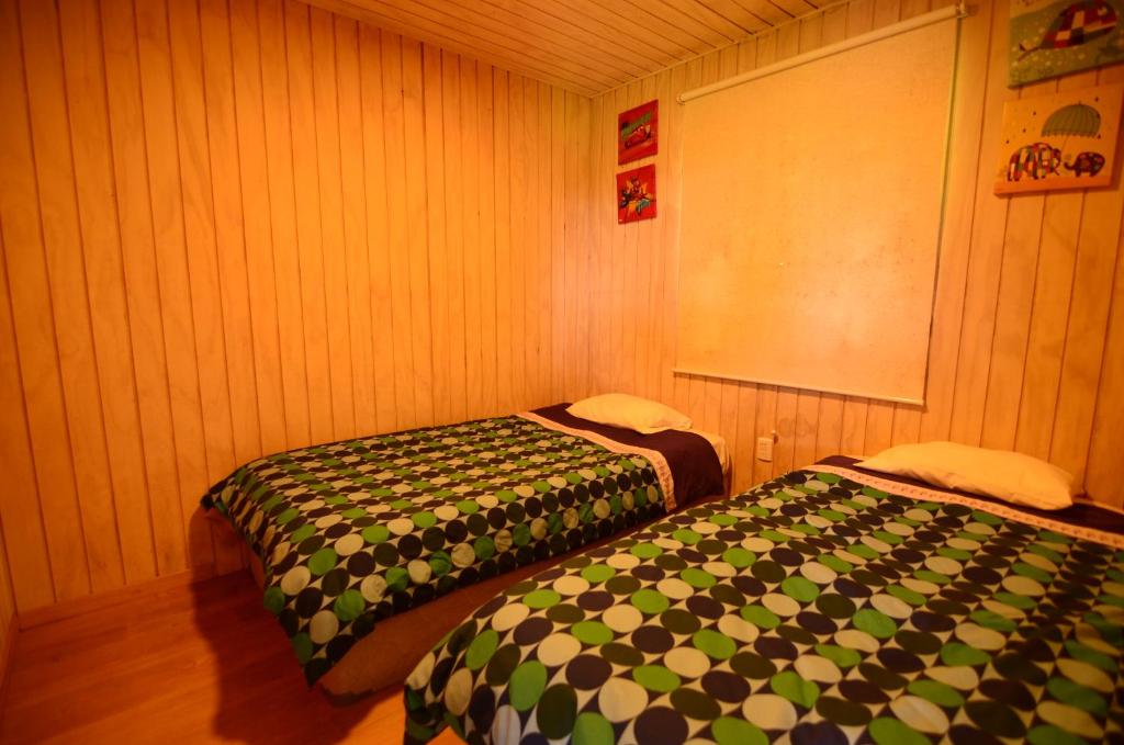 Postel nebo postele na pokoji v ubytování Nativo Lodges
