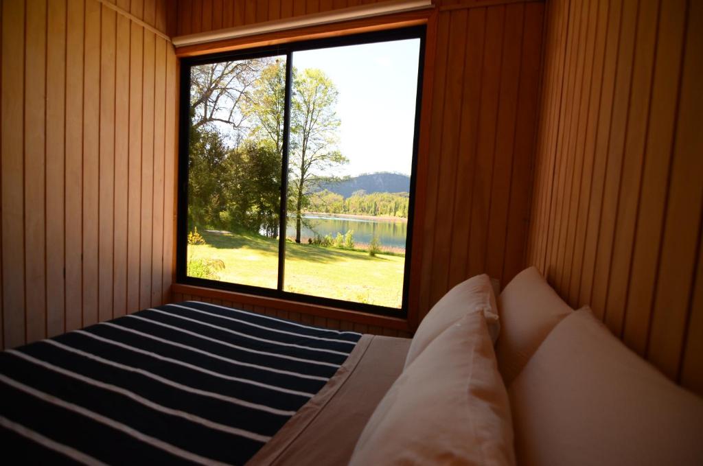 Postel nebo postele na pokoji v ubytování Nativo Lodges