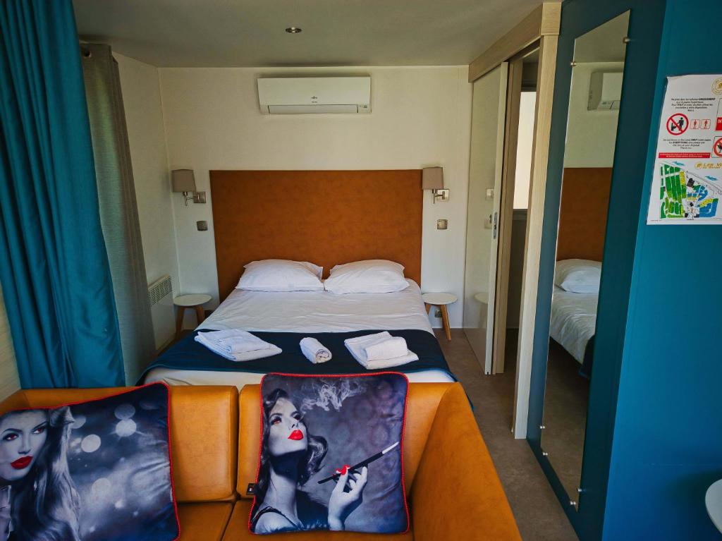 Postel nebo postele na pokoji v ubytování Lodge Hôtel & Spa Les Voiles du Grand Large