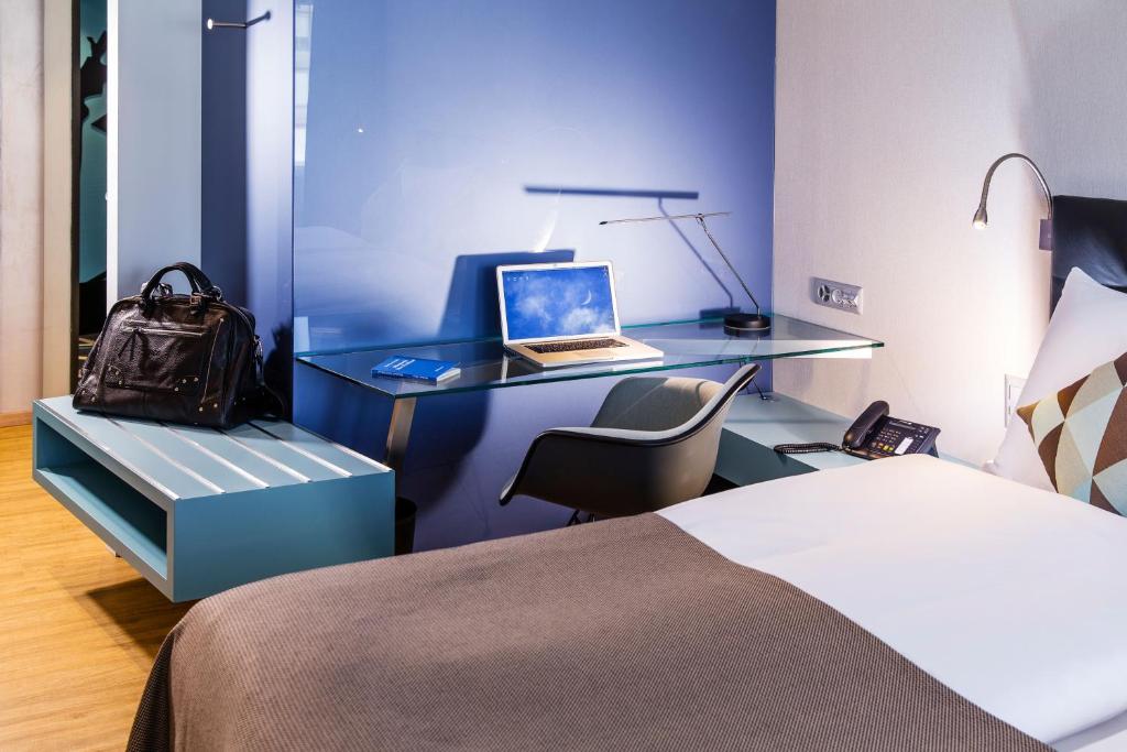 Postel nebo postele na pokoji v ubytování Hotel Arte