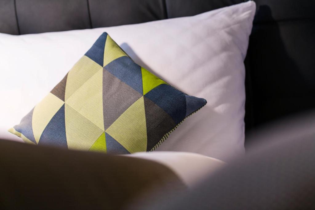 Postel nebo postele na pokoji v ubytování Hotel Arte
