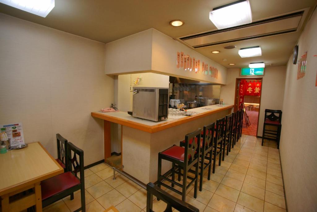 Kuchyň nebo kuchyňský kout v ubytování Hotel Kaminoyu Onsen