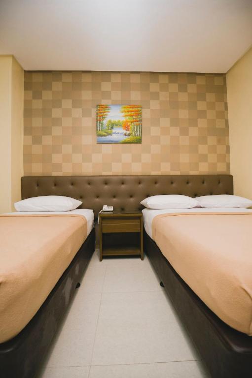 Postel nebo postele na pokoji v ubytování Hotel 801