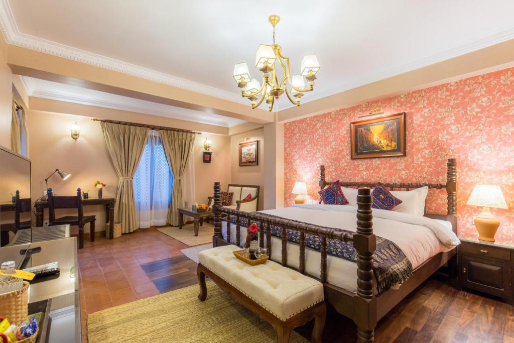 Postel nebo postele na pokoji v ubytování Baber Mahal Vilas - The Heritage Hotel
