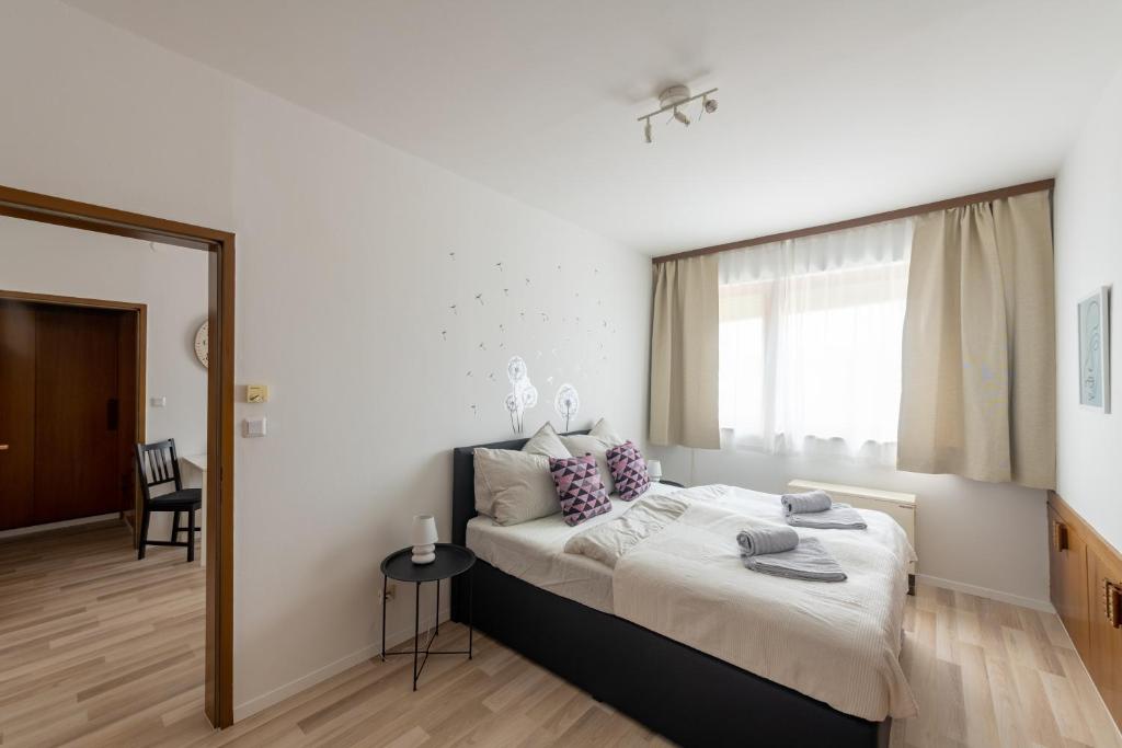 Posteľ alebo postele v izbe v ubytovaní Wohhhlfühl Appartement im Zentrum Graz