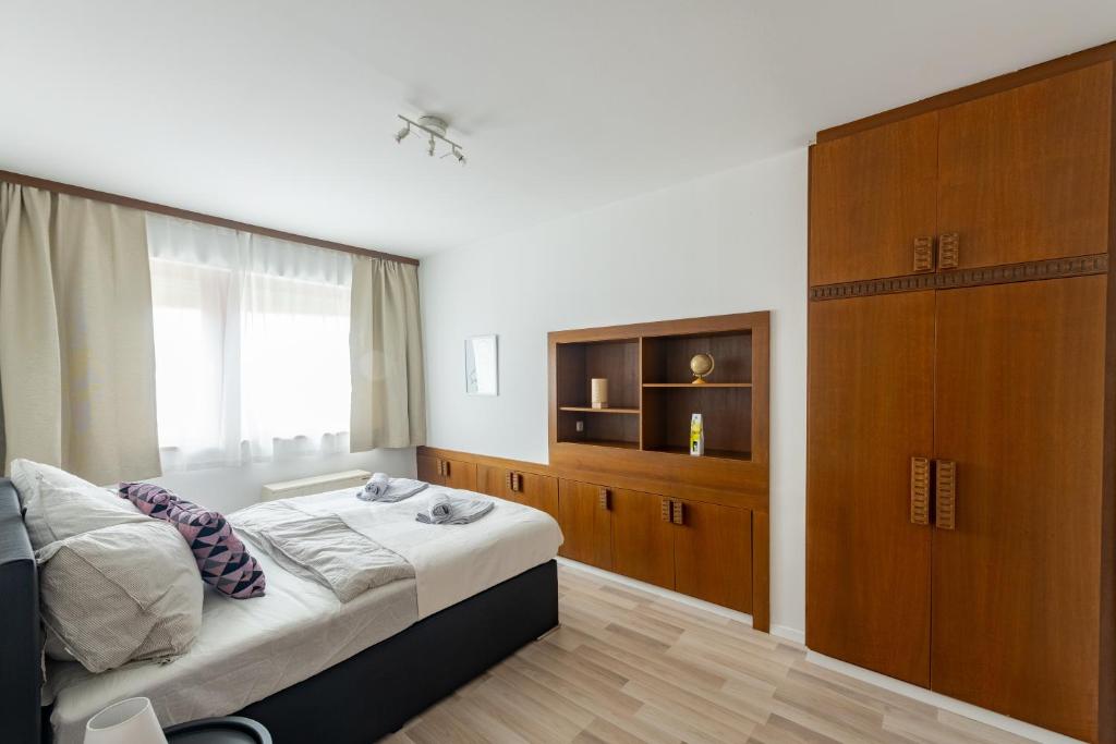 Posteľ alebo postele v izbe v ubytovaní Wohhhlfühl Appartement im Zentrum Graz