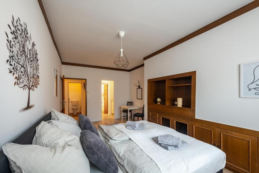 Posteľ alebo postele v izbe v ubytovaní Wohhhlfühl Appartement im Zentrum Graz