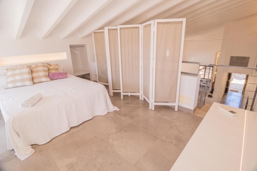 Postel nebo postele na pokoji v ubytování Finca CAN LLORENC by Mallorca Villa Selection