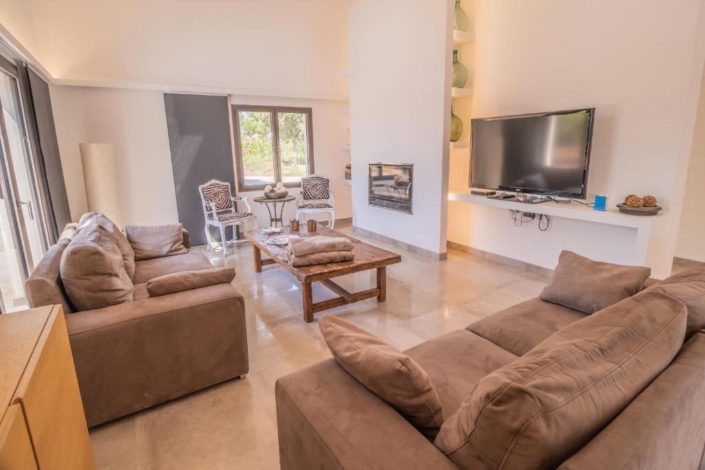 TV a/nebo společenská místnost v ubytování Finca CAN LLORENC by Mallorca Villa Selection