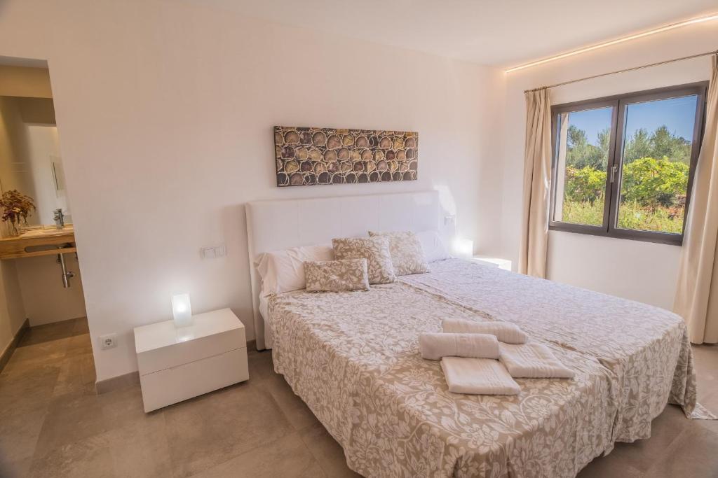 Postel nebo postele na pokoji v ubytování Finca CAN LLORENC by Mallorca Villa Selection